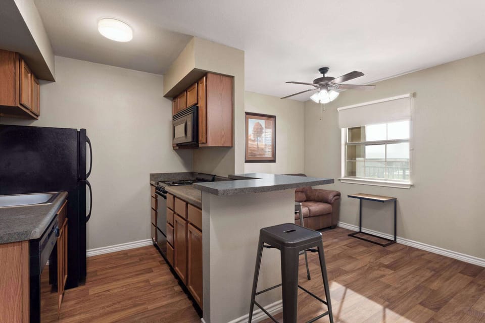 Suite, 1 Bedroom, Non Smoking | Private kitchen | Full-size fridge, microwave, stovetop, dishwasher