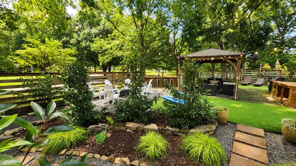 Resort Style Backyard
• Covered gazebo with 65" Smart TV and fans
• Outdoor Bar with Seating for 6 and mini-beverage refrigerator
• Gas grill
• Outdoor dining table with seating for 6
• Multiple lounge areas
• Cornhole, Giant Jenga, and outdoor games
