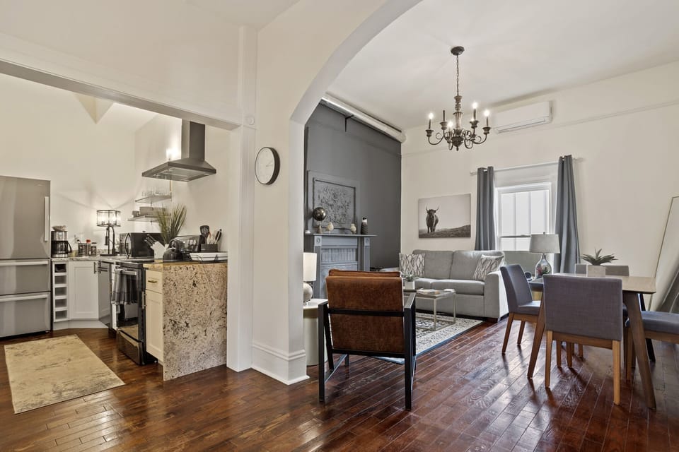 Beautiful Open Concept, 12 Foot Ceilings, Original Hardwood Floors. 