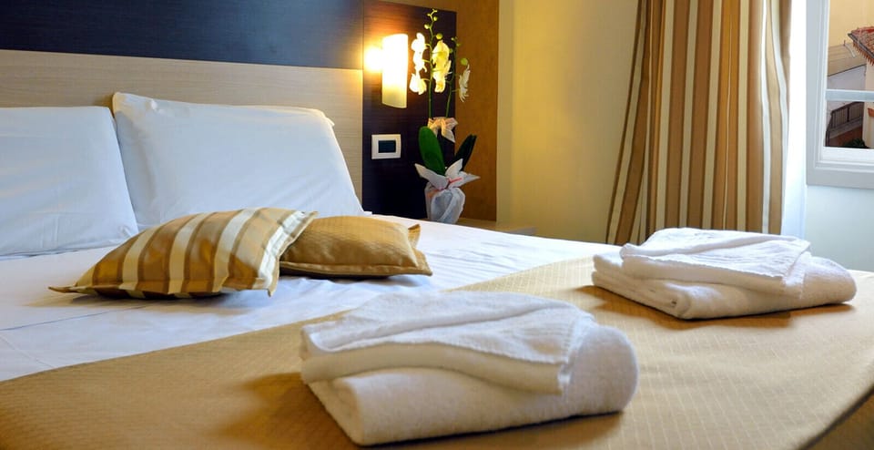 Triple Room | Down comforters, Select Comfort beds, minibar, in-room safe