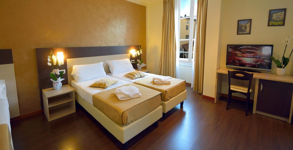 Triple Room | Down comforters, Select Comfort beds, minibar, in-room safe
