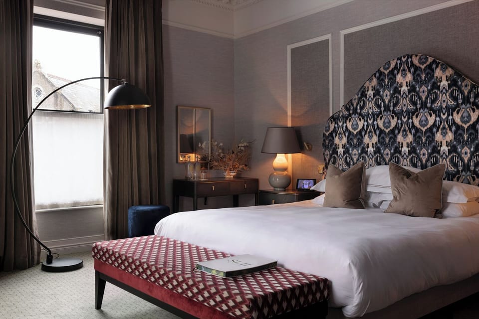 Signature Deluxe Room | In-room safe, blackout drapes, iron/ironing board, free WiFi