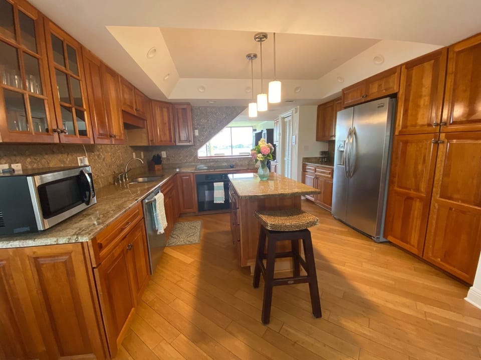 Kitchen with beautiful cherry cabinets and granite counter tops