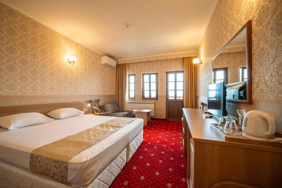 Standard Double or Twin Room | Minibar, in-room safe, free WiFi, bed sheets