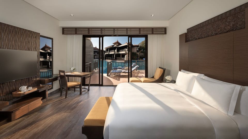 Lotus Lagoon Access Room - Adults Only, Direct Lagoon Access, Private Terrace, Adults-Only Swimming | Egyptian cotton sheets, premium bedding, minibar, in-room safe