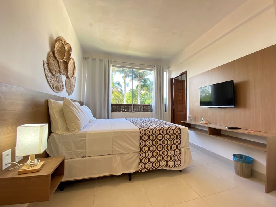Suite Sol Família s/Varanda - Standard Família | Minibar, in-room safe, blackout drapes, free WiFi