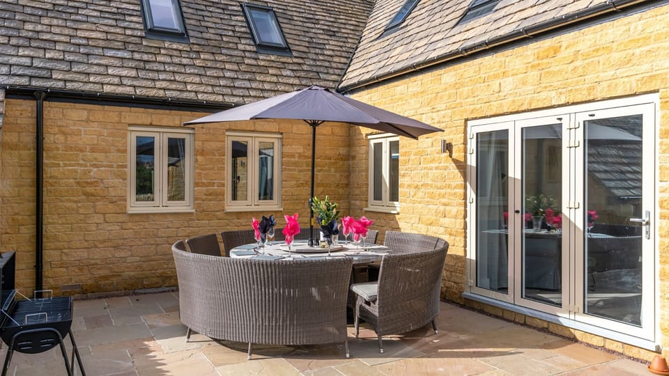 Patio area with seating,  Maple House, Bolthole Retreats