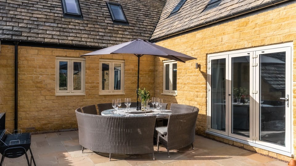 Patio area with seating,  Maple House, Bolthole Retreats