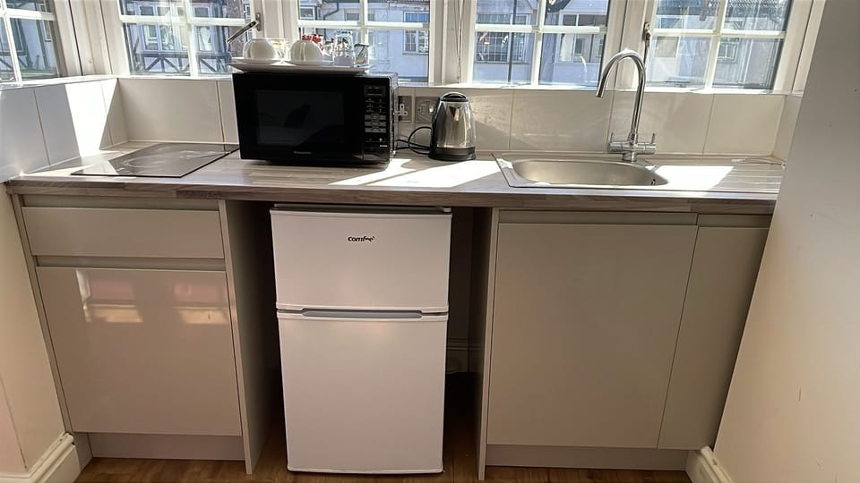 Full-size fridge, microwave, coffee/tea maker