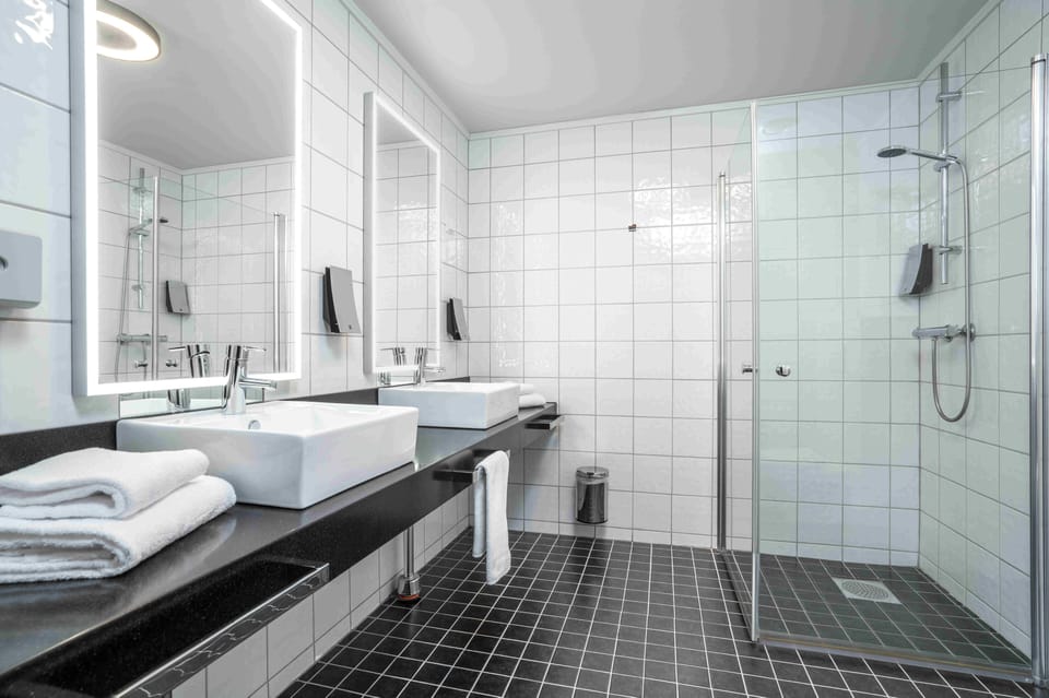 Combined shower/tub, eco-friendly toiletries, hair dryer, towels