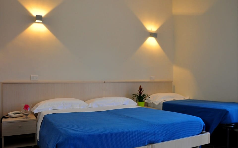 Comfort Triple Room, Balcony, Oceanfront | Desk, wheelchair access
