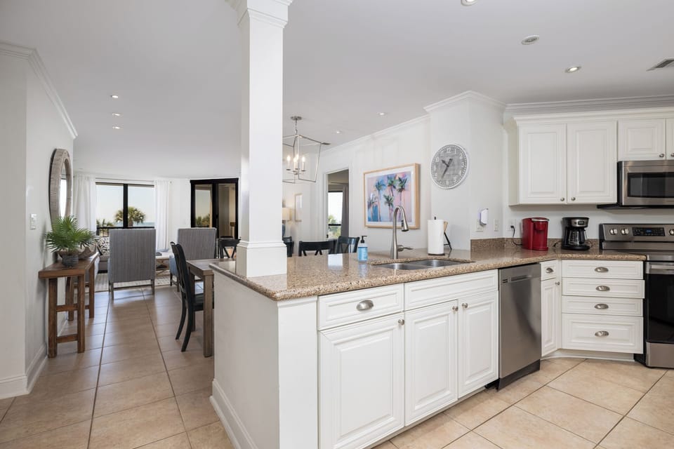 Your kitchen overlooks the dining and living space