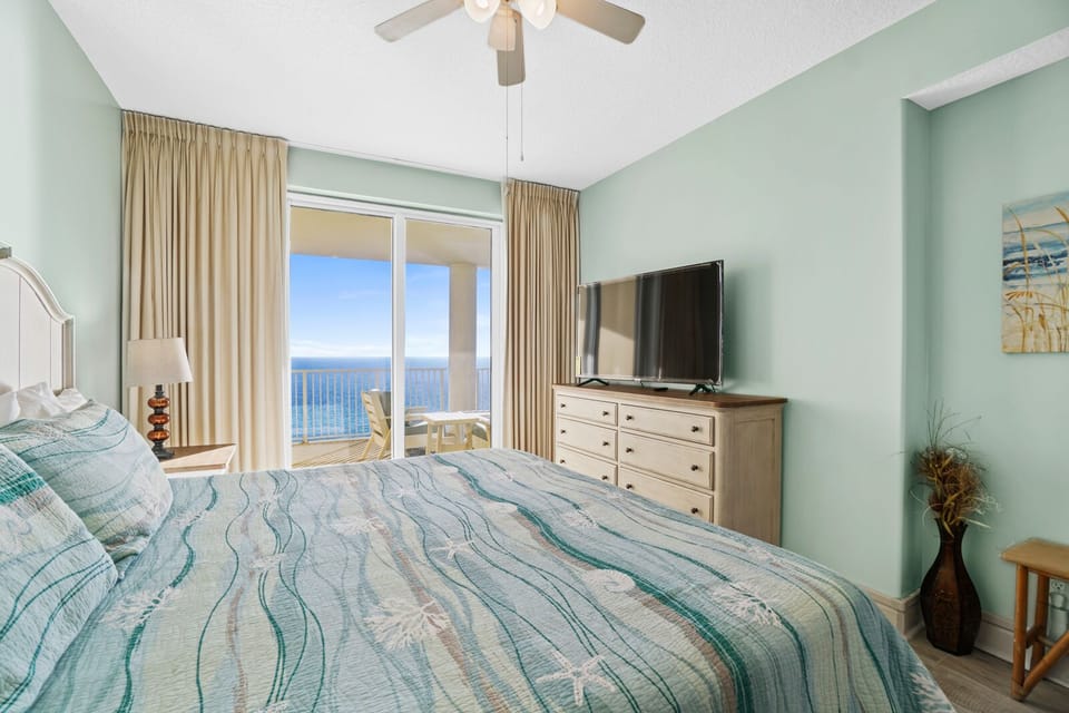 Drift off to sleep in your coastal bedroom sanctuary with stunning ocean views and soothing sea-inspired colors welcoming peaceful dreams.