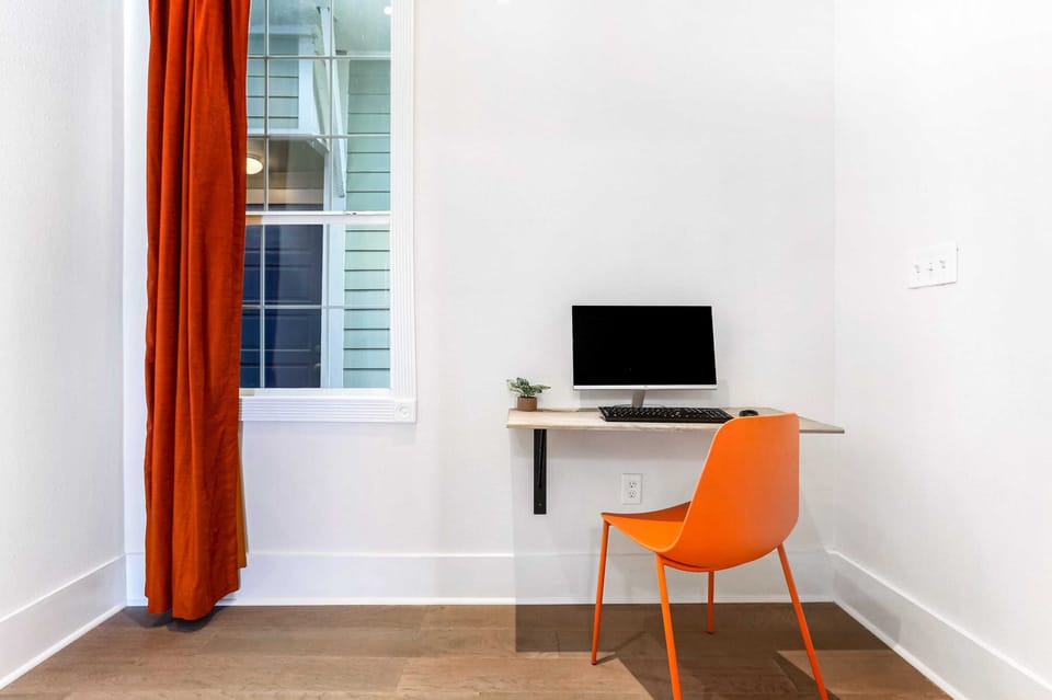 Office ledge.  This desk has a monitor and keyboard which you can plug your laptop into.