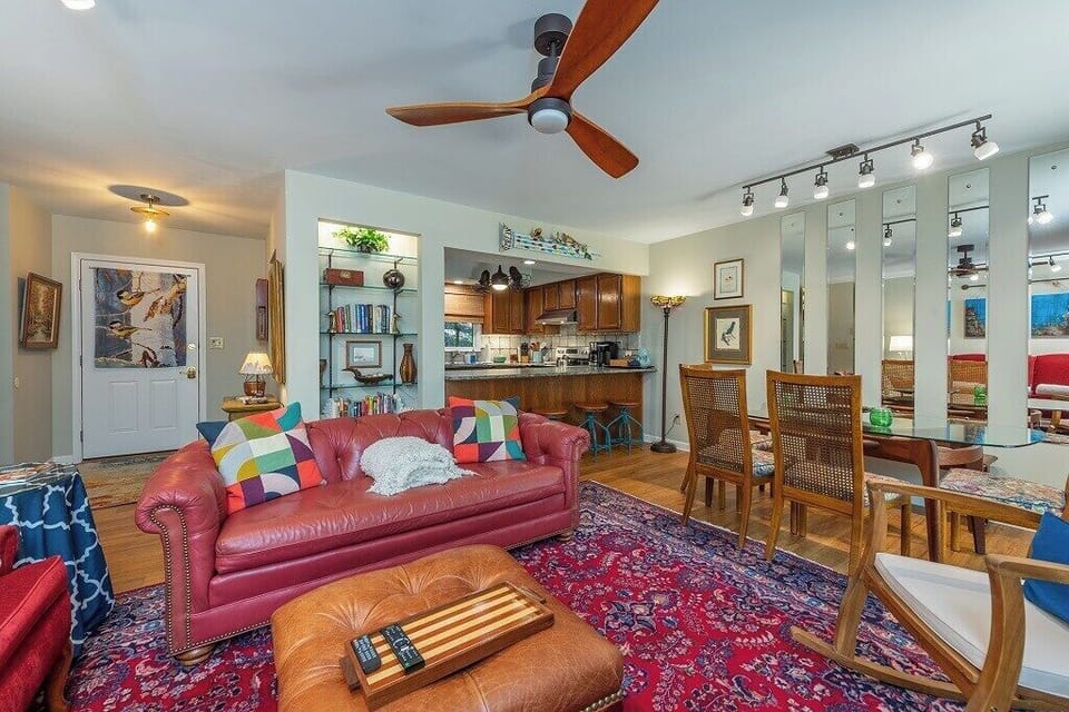 Living room and dining room combo with open kitchen.