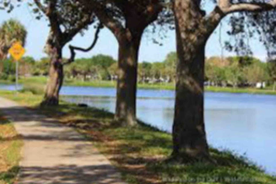 Crescent Lake it’s only two blocks away beautiful walking path around a large lake tennis courts dog park kids playground