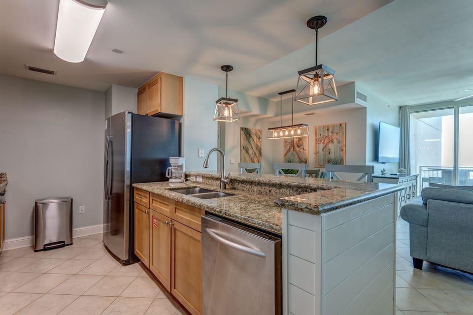 Stainless steel appliances and granite countertops.