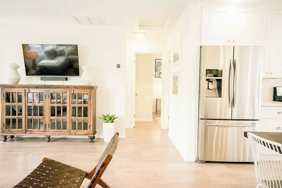 Open concept perfection! Our living, dining, and kitchen space seamlessly blend together, creating the ultimate hub for relaxation and entertainment. 🏡✨