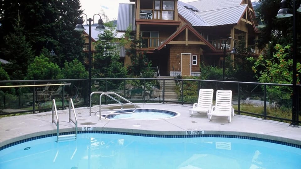 Heated pool area with hot tub, sauna, fitness area/showers 