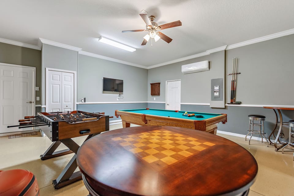 Amazing Game room with pool table and foosball