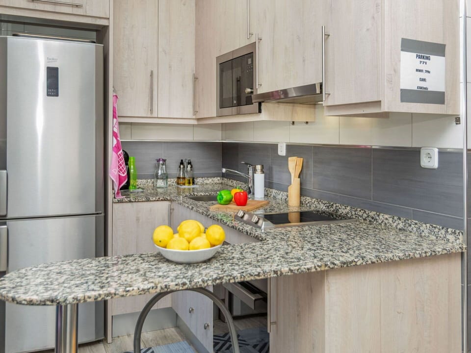 Kitchen, Kitchen Appliance, Countertop, Furniture, Major Appliance, Interior Design, Flooring, Cabinetry, Wood, Floor