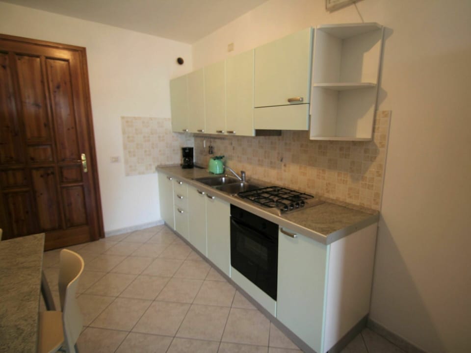 Brown, Cabinetry, Kitchen Sink, Countertop, Sink, Building, Tap, Plumbing Fixture, Kitchen Appliance, Kitchen