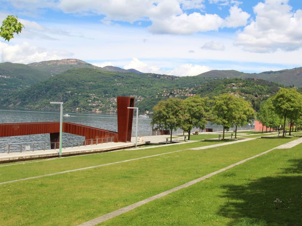 Cloud, Sky, Mountain, Plant, Land Lot, Natural Landscape, Grass, Tree, Urban Design, Leisure