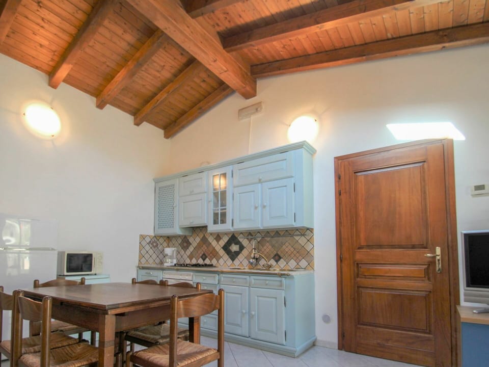 Furniture, Property, Cabinetry, Table, Wood, Building, Interior Design, Flooring, Floor, Wood Stain