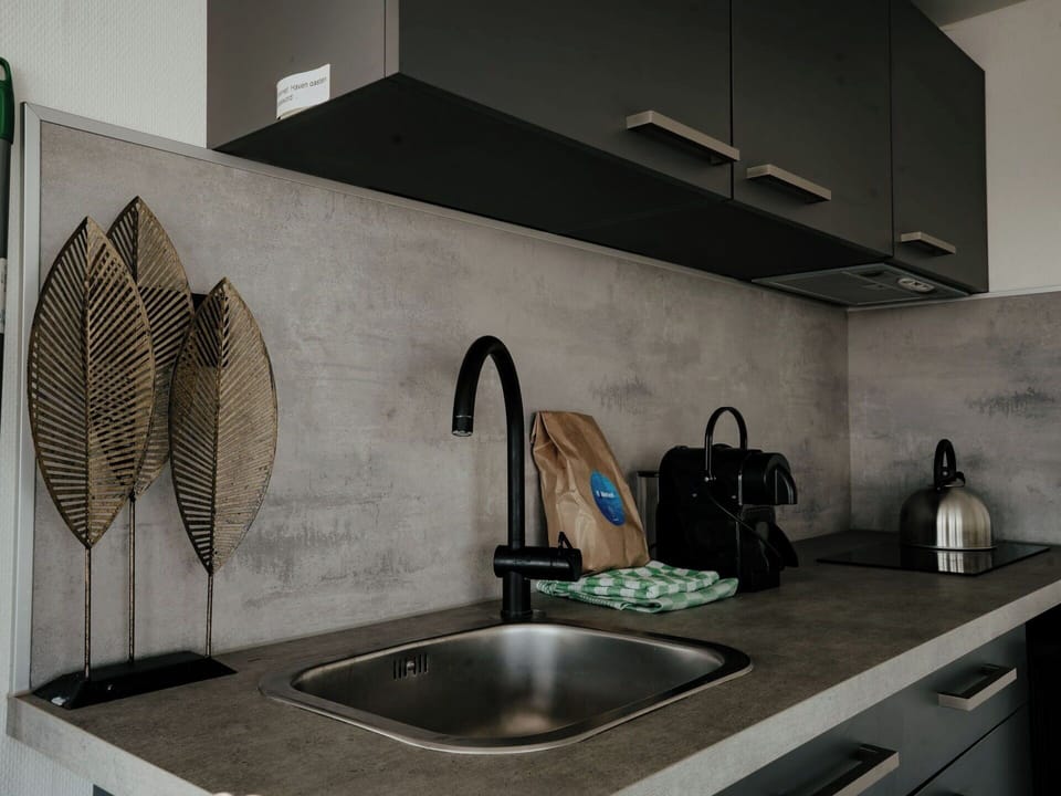 Countertop, Kitchen, Interior Design, Flooring, Sink, Kitchen Sink, Plumbing Fixture, Cabinetry, Tap