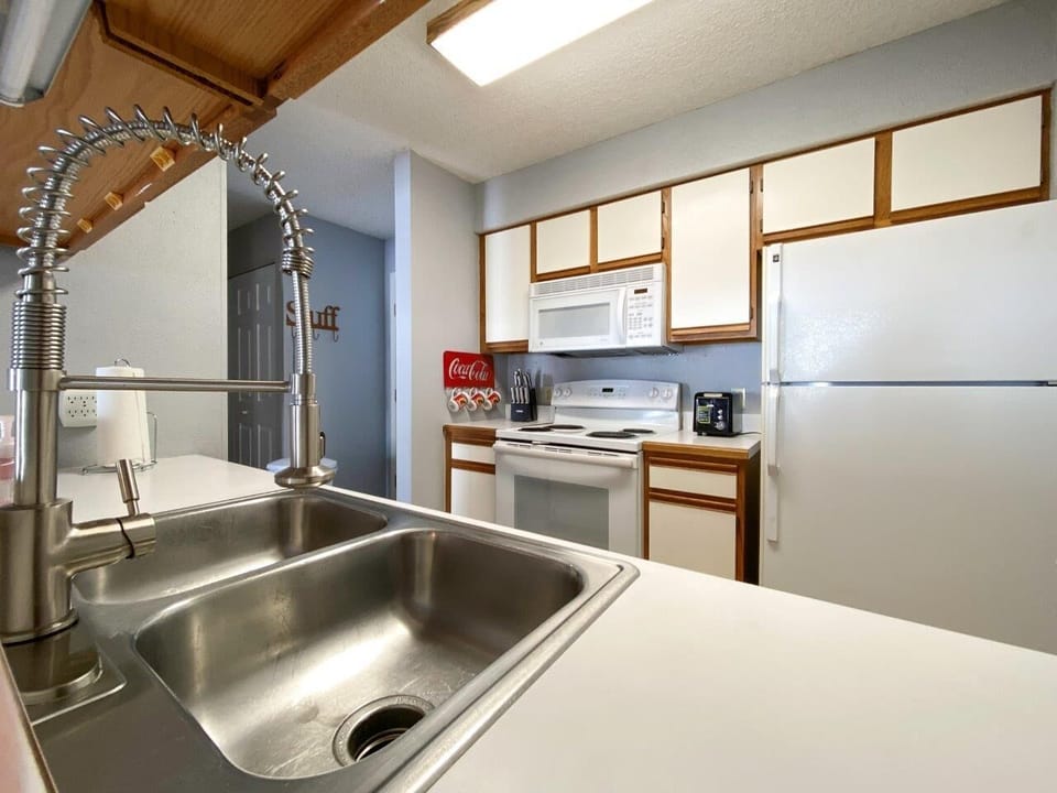  Kitchen overlooks Dining and Living Rooms.