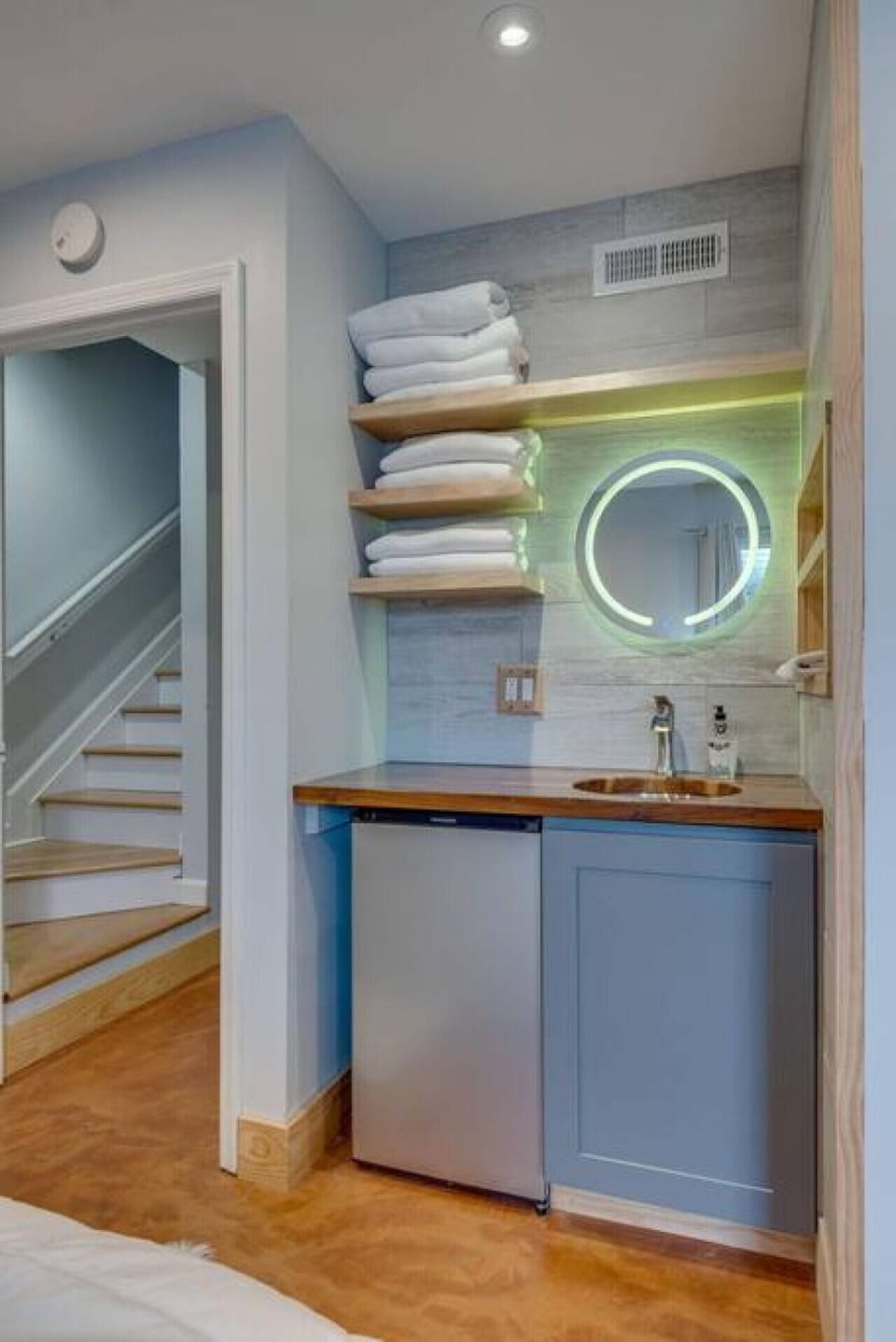 Powder area of lower level bedroom, master suite.