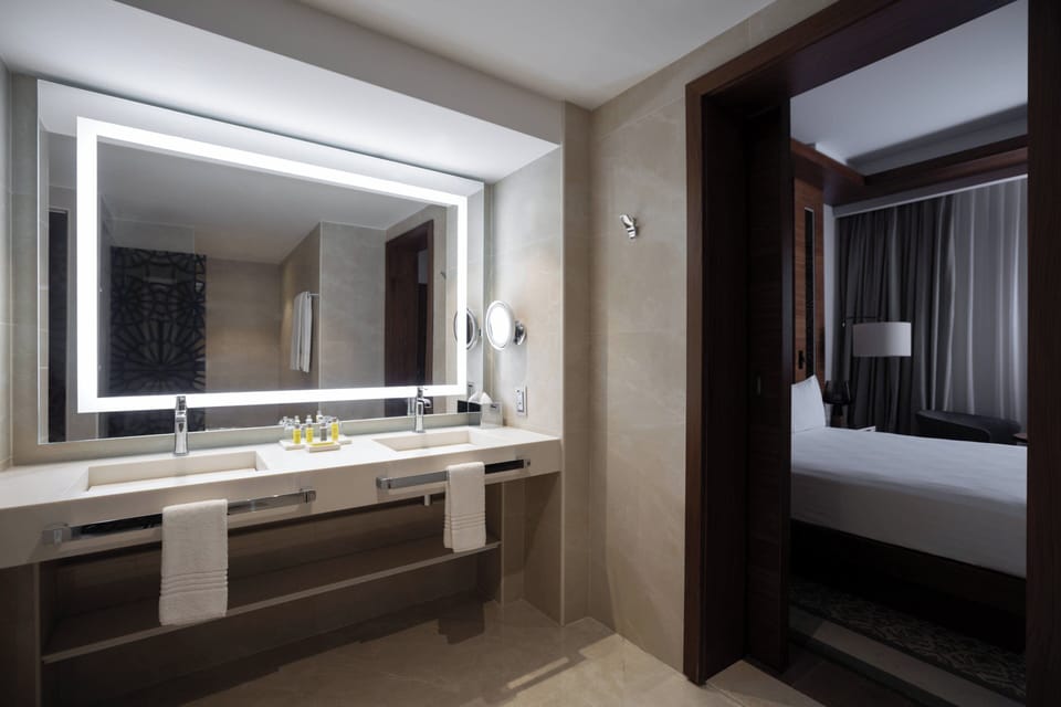 Junior Suite, 1 Bedroom | Bathroom | Shower, free toiletries, hair dryer, bathrobes