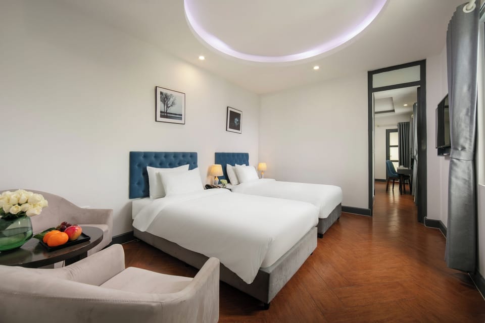 Executive Quadruple Room | Minibar, in-room safe, desk, soundproofing