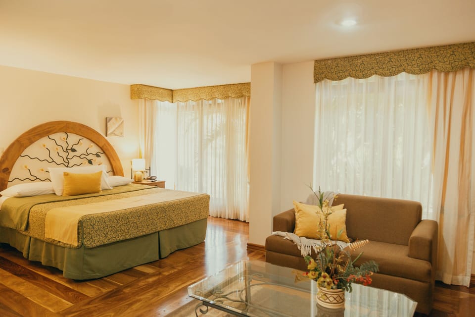 Suite, 1 King Bed | In-room safe, desk, blackout drapes, free WiFi