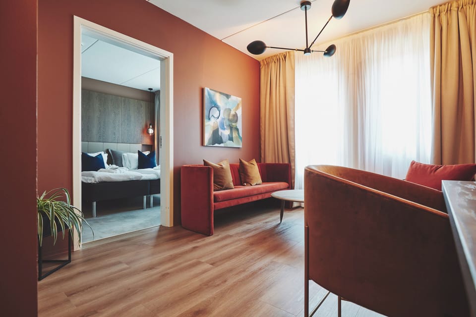 Suite | Pillowtop beds, desk, laptop workspace, blackout drapes