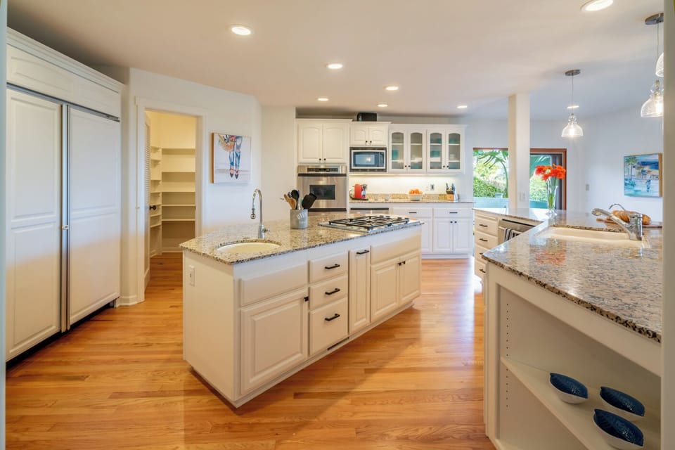 Spacious kitchen features 2 islands