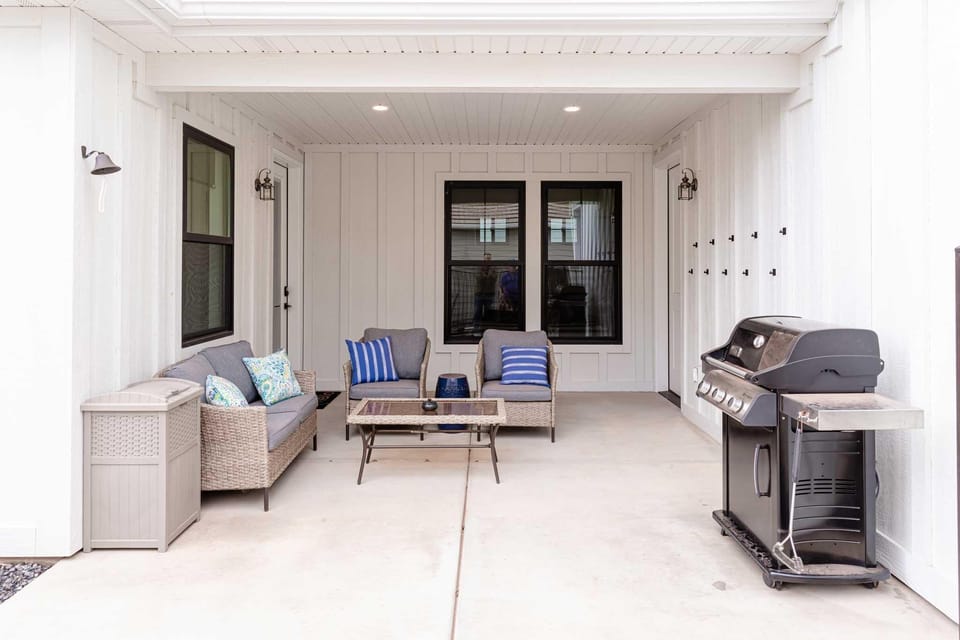 outdoor patio seating with grill