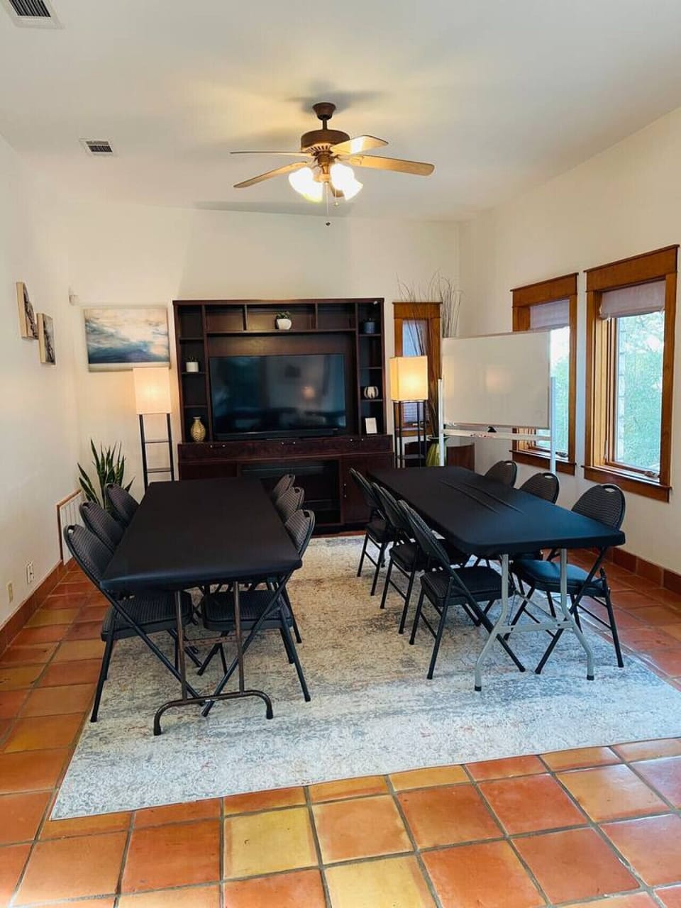 Meeting space for 24 people. Business WiFi, Smart TV, white board, screen, easel included!