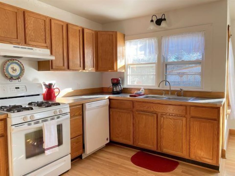 Kitchen with gas range and dishwasher makes preparing meals a pleasure