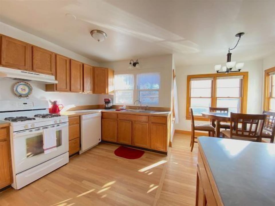 Kitchen, dining dining area and breakfast bar