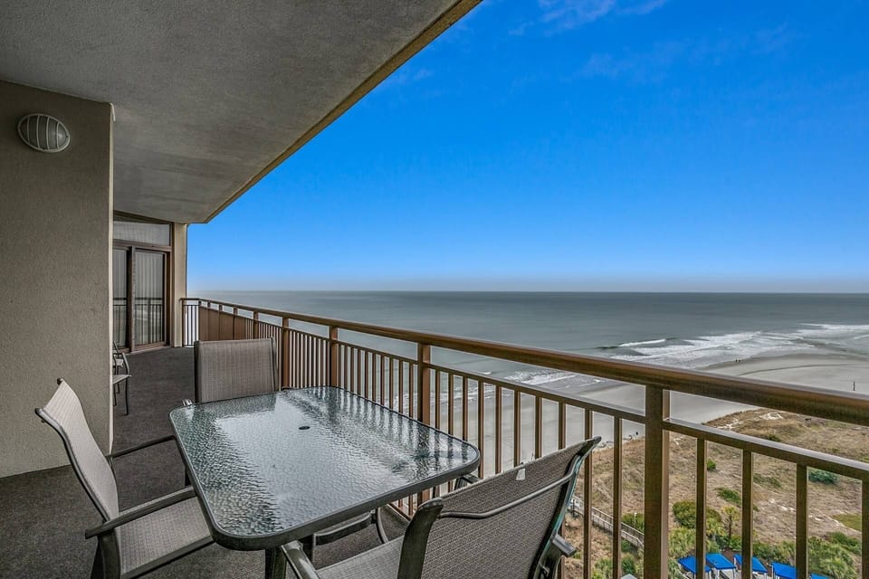 The 16th floor private balcony with stunning, panoramic ocean views — the perfect backdrop to your stay
