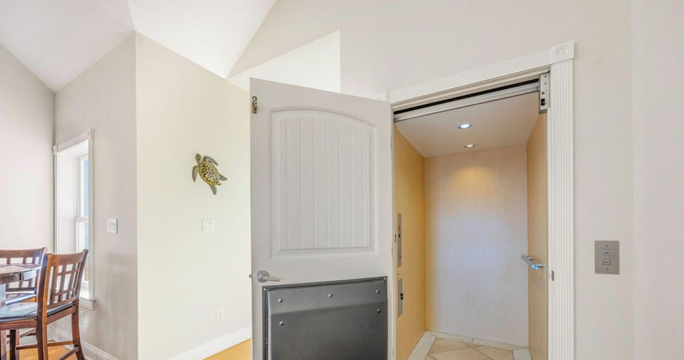 Surf or Sound Realty - 575 - Rodanthe Paradise - Elevator - Label