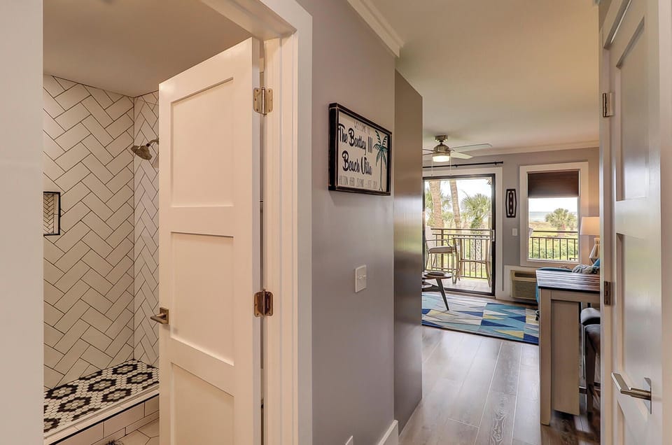Sea Side Villa 122 Entry Hallway. - Upon entry into this beautiful newly renovated unit your sights are drawn to the windows and balcony overlooking the Atlantic Ocean.