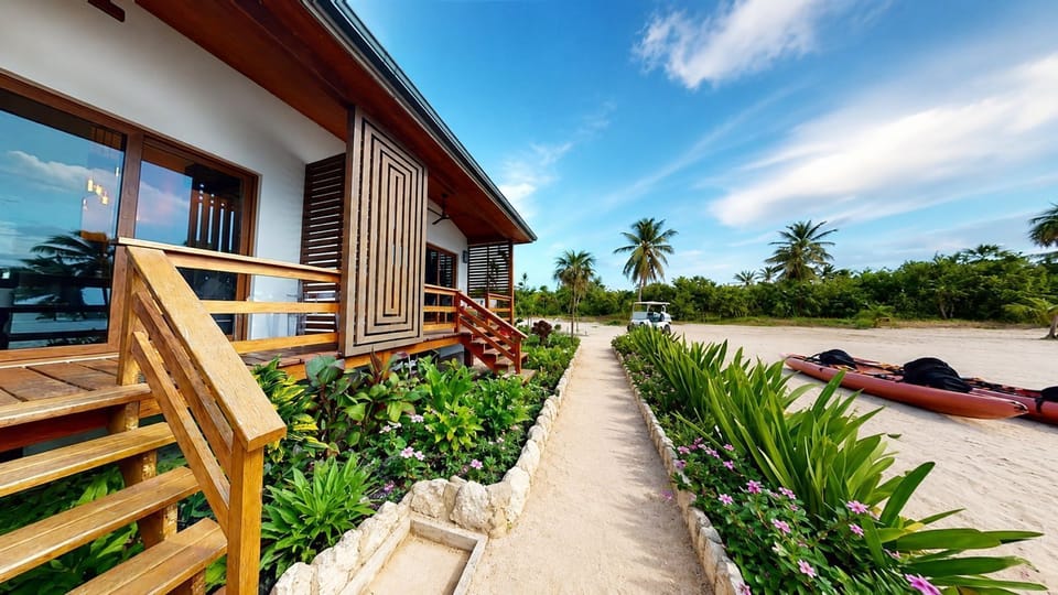 Step into serenity on the front porch of our exquisite villas at Alom Estates. The welcoming ambiance is framed by the gentle rustle of palm leaves and the melody of rolling waves, creating an instant sense of tranquility.

