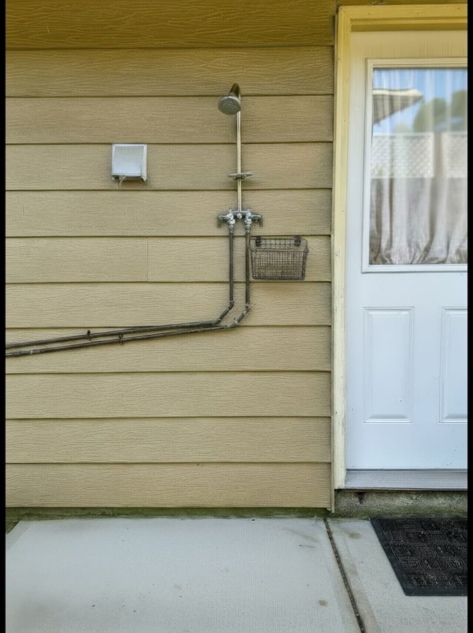 Convenient outdoor rinse shower for sandy days at the beach.