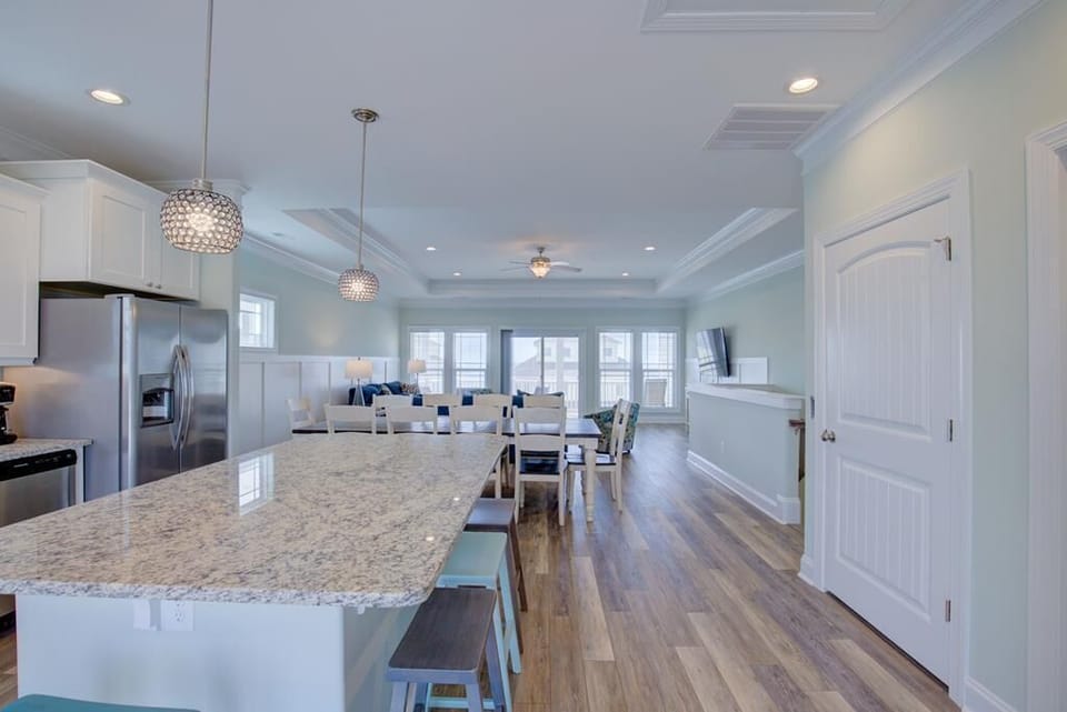  Kitchen opens to dining to living area, to ocean view deck w/ hot tub