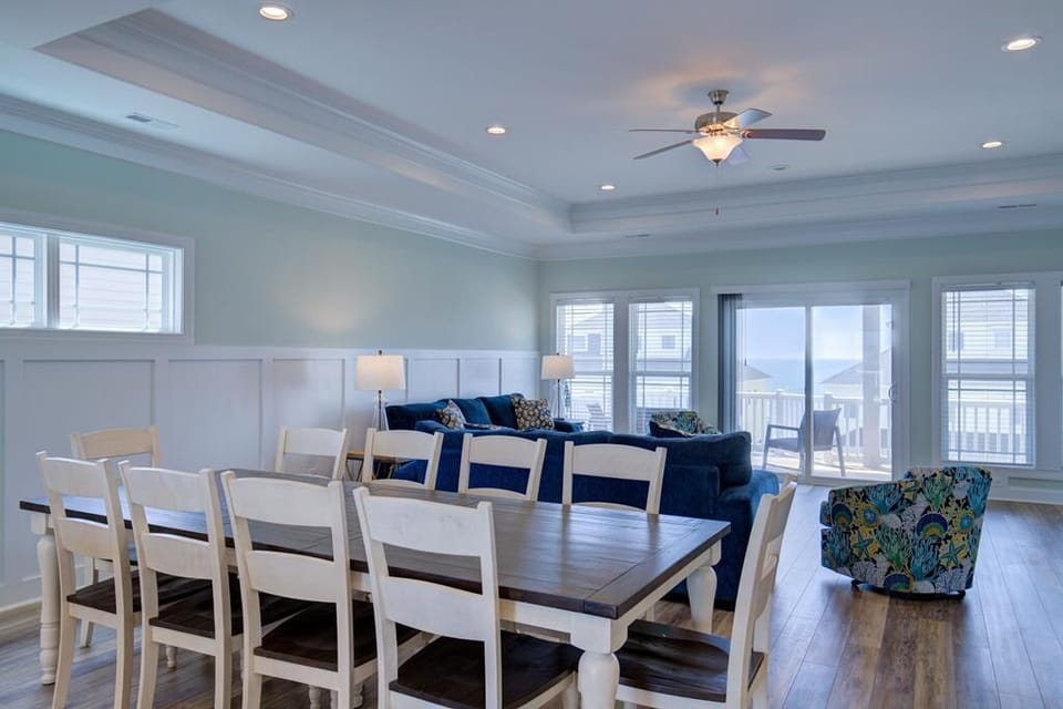 Open floor design, dining for 10, living room opens up to deck w/ hot tub
