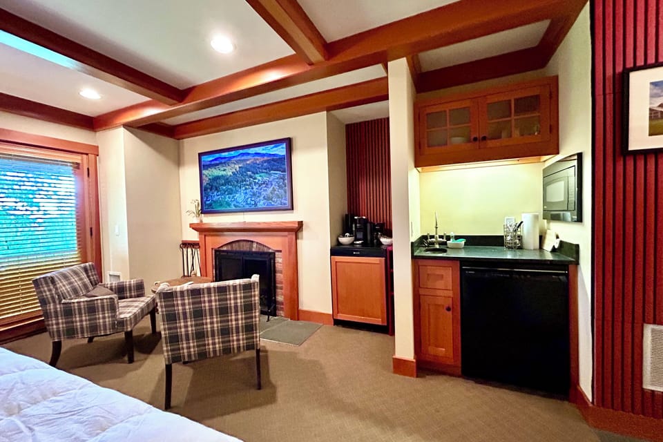 1st floor king suite: kitchen, dining, dishwasher, balcony, frame tv, etc.