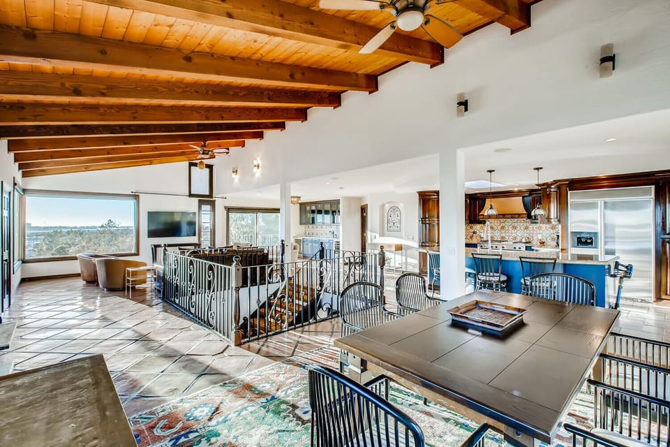 huge dining table with open plan to allow all to enjoy together