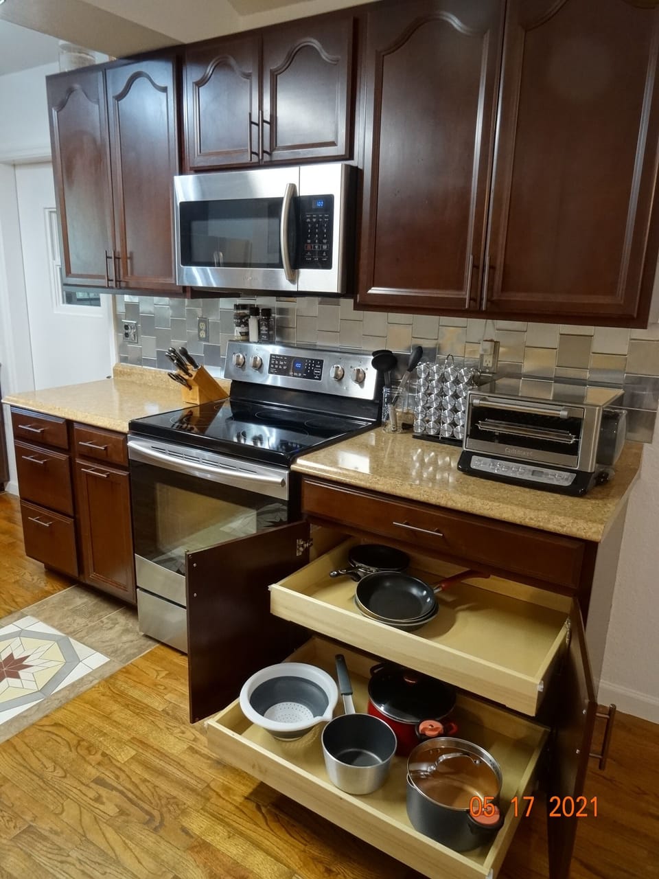 Updated kitchen stocked with everything you could want for large family meals.